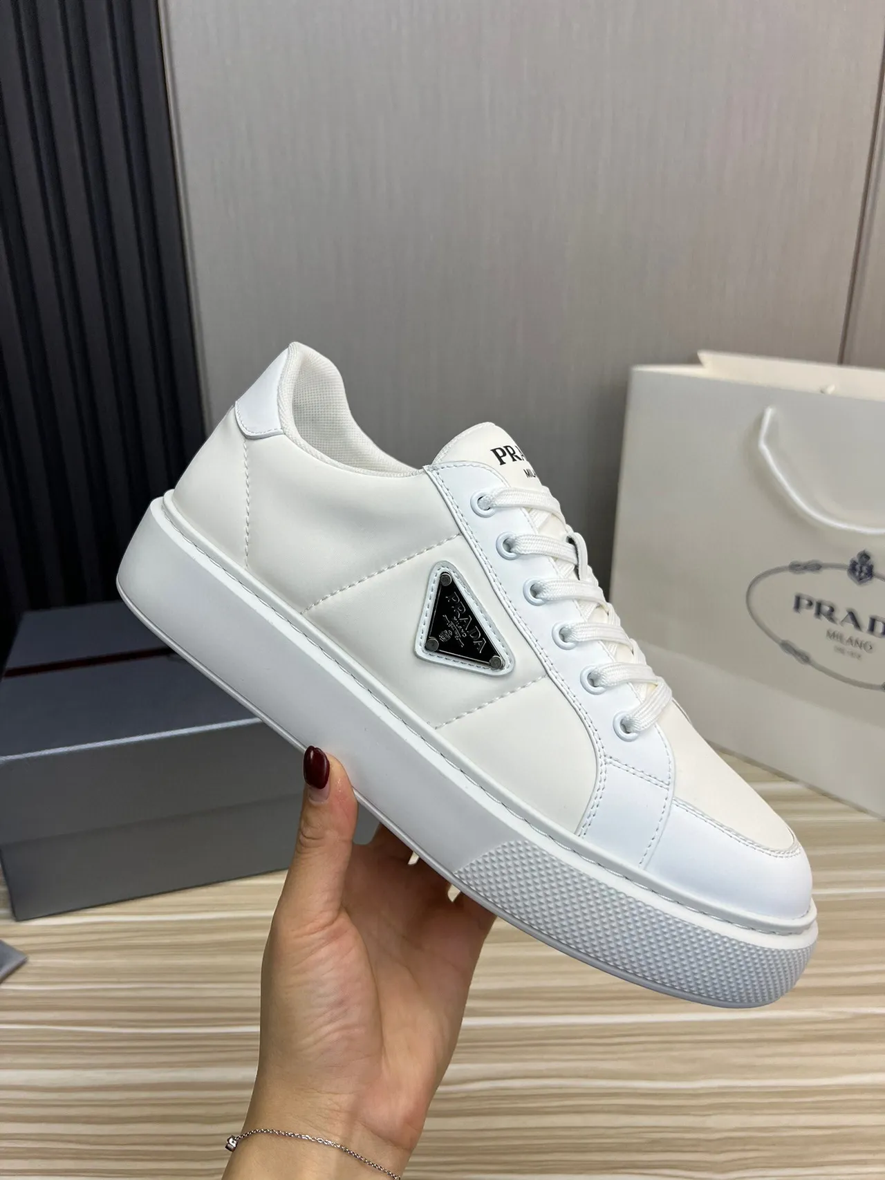 Prada Cloudbust White Black Leather-Like Upper Triangular Metal Logo Patch Lifestyle Sneakers 4