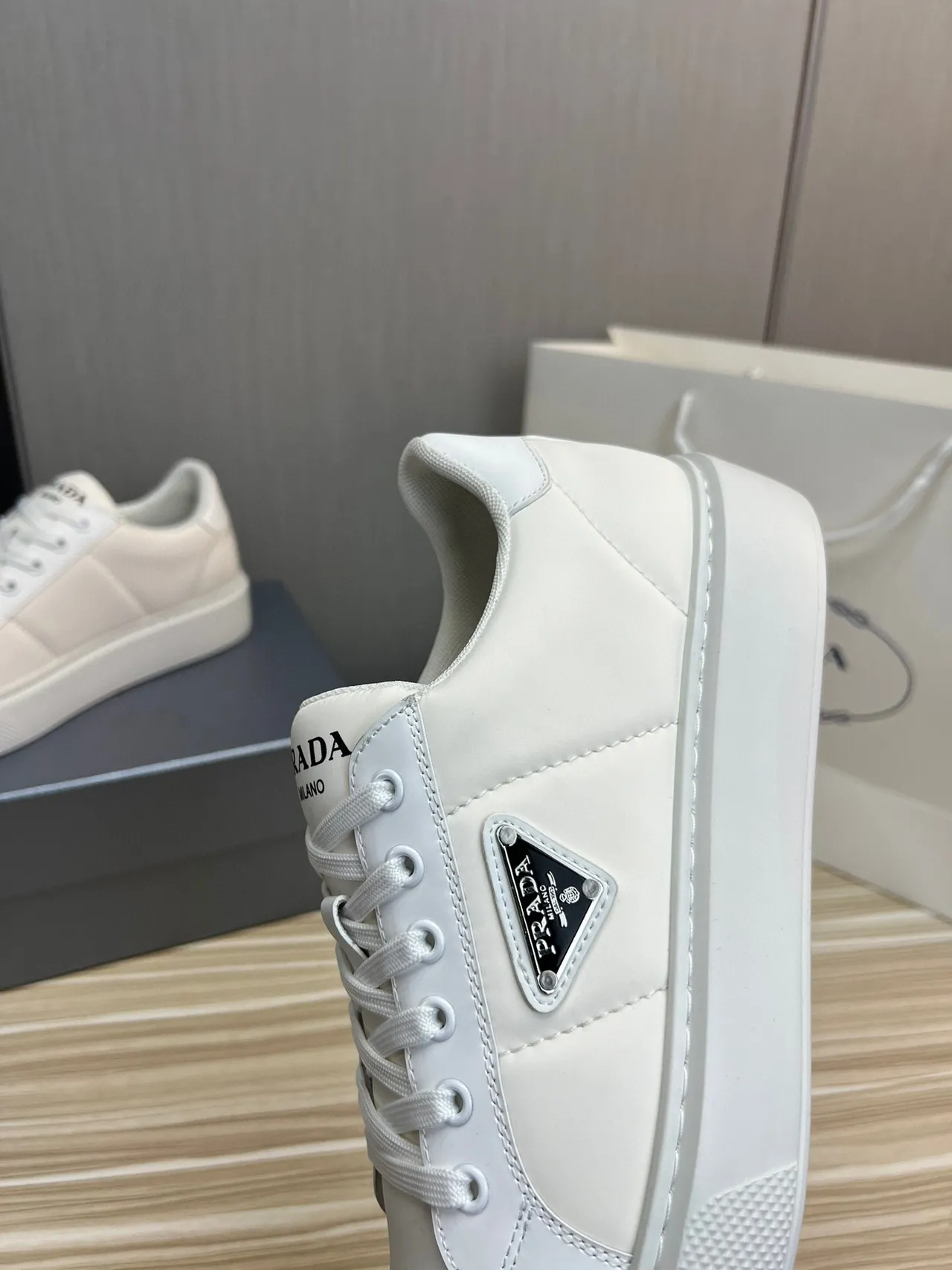 Prada Cloudbust White Black Leather-Like Upper Triangular Metal Logo Patch Lifestyle Sneakers 5