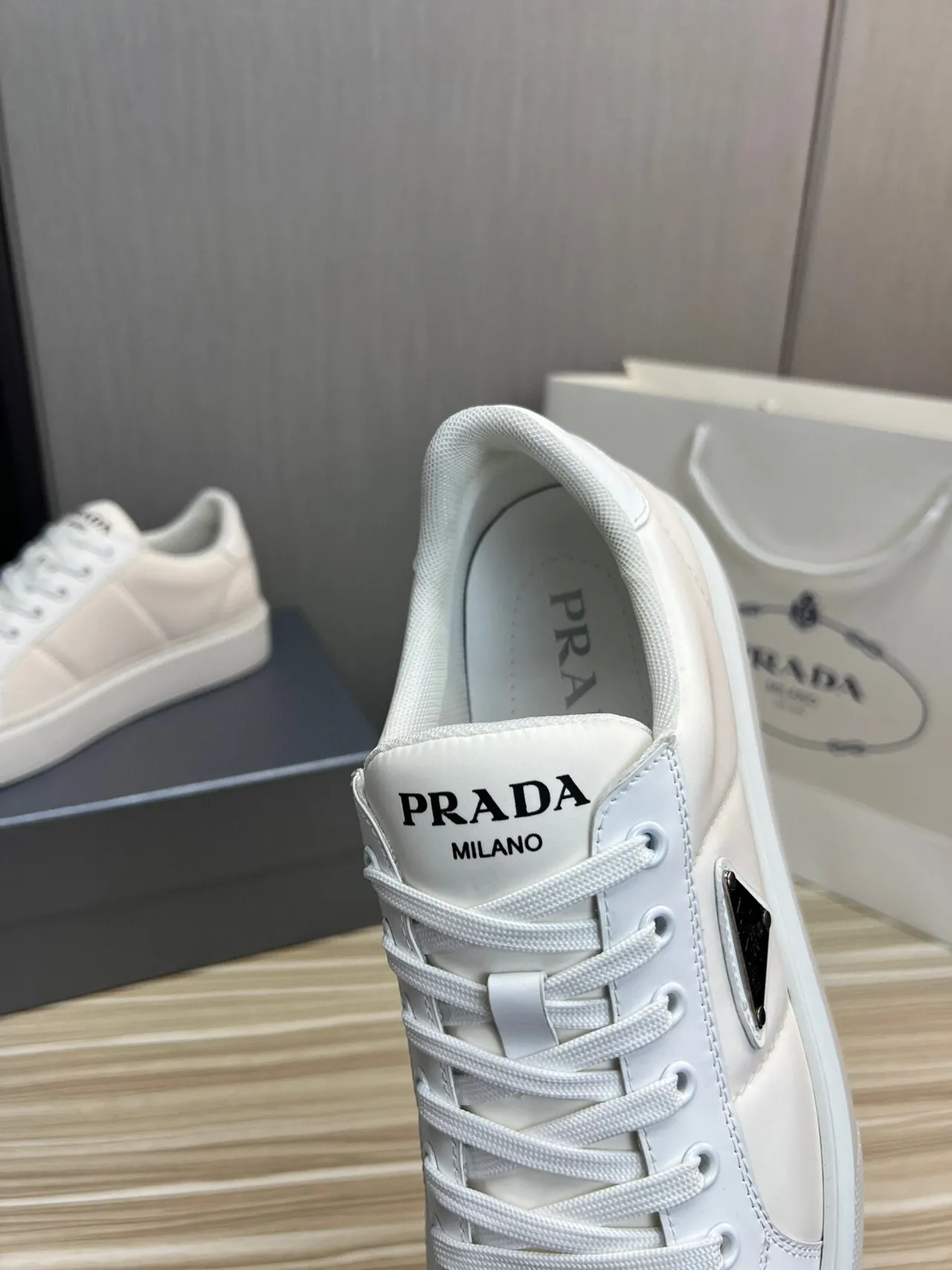 Prada Cloudbust White Black Leather-Like Upper Triangular Metal Logo Patch Lifestyle Sneakers 6