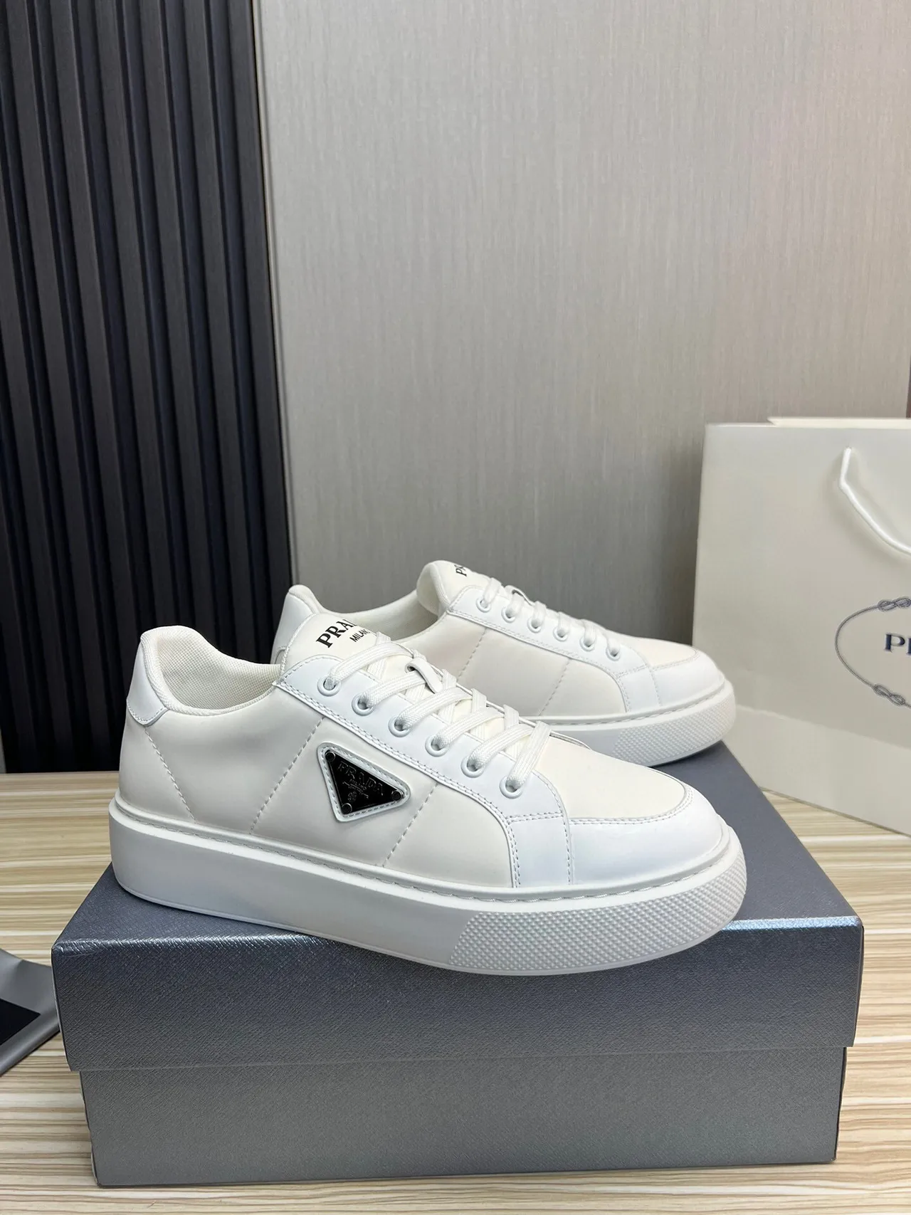 Prada Cloudbust White Black Leather-Like Upper Triangular Metal Logo Patch Lifestyle Sneakers 8