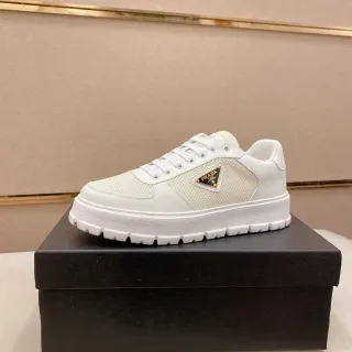 Prada Chaussures Lifestyle Blanc et Beige Semelle Plateforme Tige Maille et Cuir
