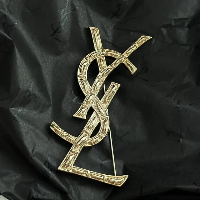 Saint Laurent Monogram Interlocking YSL Gold-Tone Brooch 8