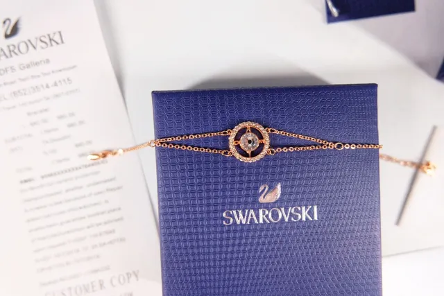 Swarovski Corrente dourada e branca com motivo circular de cristal bracelete 2
