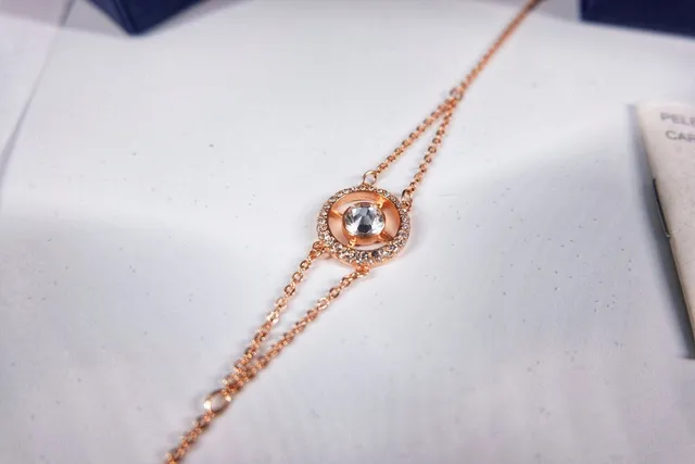 Swarovski Corrente dourada e branca com motivo circular de cristal bracelete 3