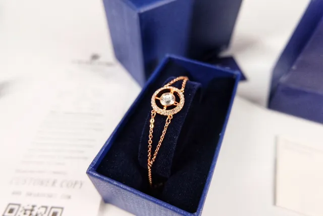 Swarovski Corrente dourada e branca com motivo circular de cristal bracelete 5