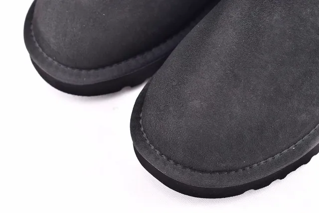 UGG Classic Mini Black Shearling-Lined Snow Boots 10