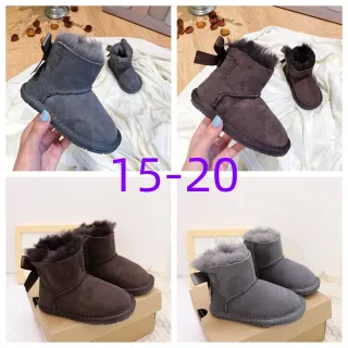 UGG Classic Mini Bow Botas de Nieve con Forro de Cordero Gris Carbón