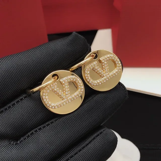 Valentino VLTN Brincos Discos Circulares Pavé Cristal Tom Dourado 9
