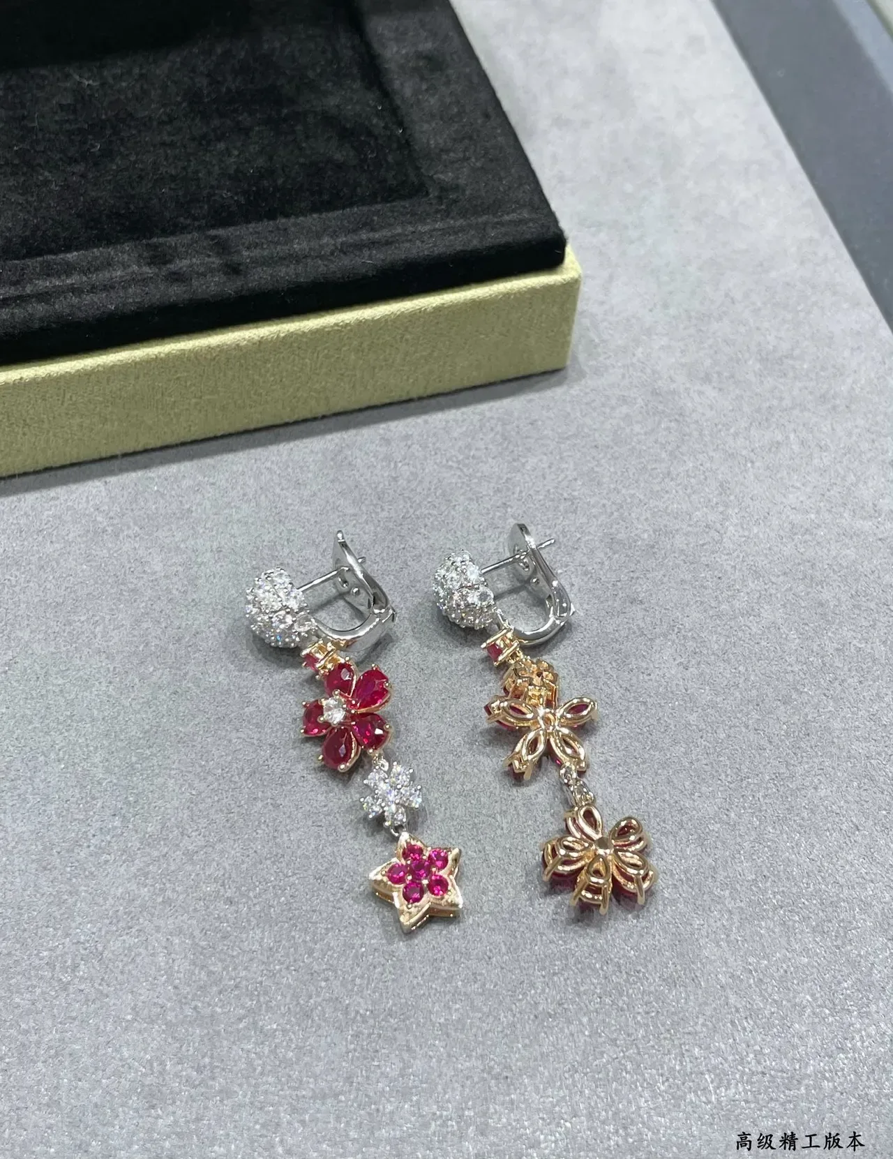 Van Cleef & Arpels أقراط بنمط زهوري ونجمي مصنوعة من الياقوت والماس 5