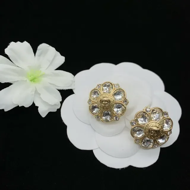 Broche Versace Medusa Floral en or et argent en forme de fleur avec cristaux 5