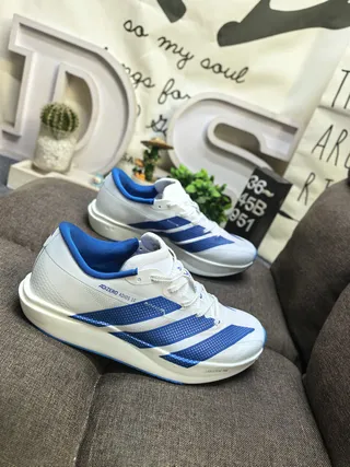Adidas Adizero Adios 10 Zapatos de correr blancos y azules 9