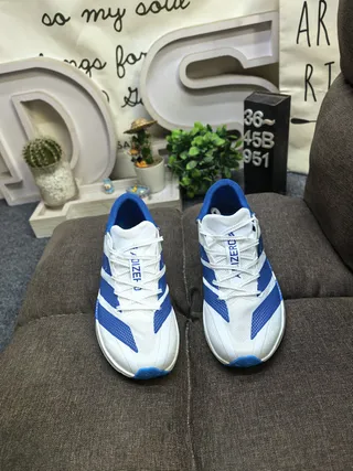 Adidas Adizero Adios 10 Zapatos de correr blancos y azules 10