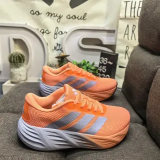 Adidas Chaussures de course avec upper en tricot orange argent, semelle intermédiaire sculptée avec arêtes