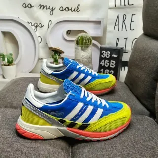 Adidas Spezial नीली पीली रेट्रो रनर सिल्हूट लेयर्ड मल्टी-कलर कंस्ट्रक्शन लाइफस्टाइल स्नीकर