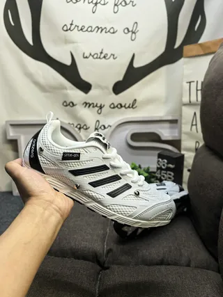 Adidas White and Black Three-Stripe Mesh Lifestyle Sneakers 5