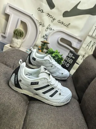 Adidas White and Black Three-Stripe Mesh Lifestyle Sneakers 9