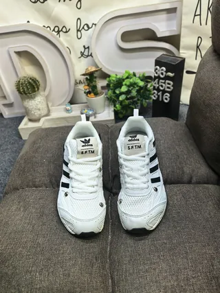 Adidas White and Black Three-Stripe Mesh Lifestyle Sneakers 10