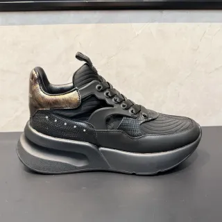 Alexander McQueen Oversized Sneaker Black Gold Platform Sole Asymmetric TPU Cage Chunky Sneakers