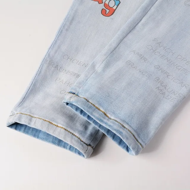 Amiri Graffiti Print Light-Wash Slim-Fit Jeans 5