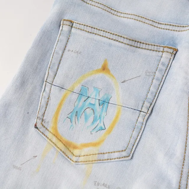 Amiri Graffiti Print Light-Wash Slim-Fit Jeans 7