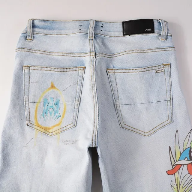 Amiri Graffiti Print Light-Wash Slim-Fit Jeans 8