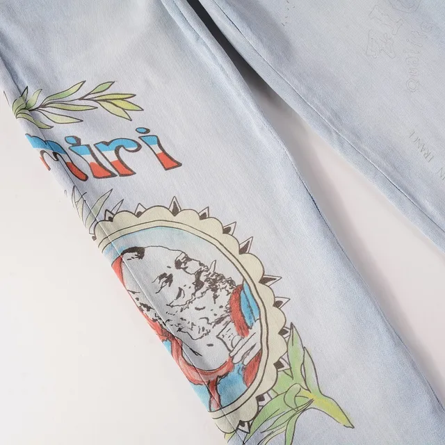 Amiri Graffiti Print Light-Wash Slim-Fit Jeans 9
