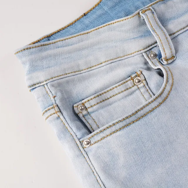 Amiri Graffiti Print Light-Wash Slim-Fit Jeans 10