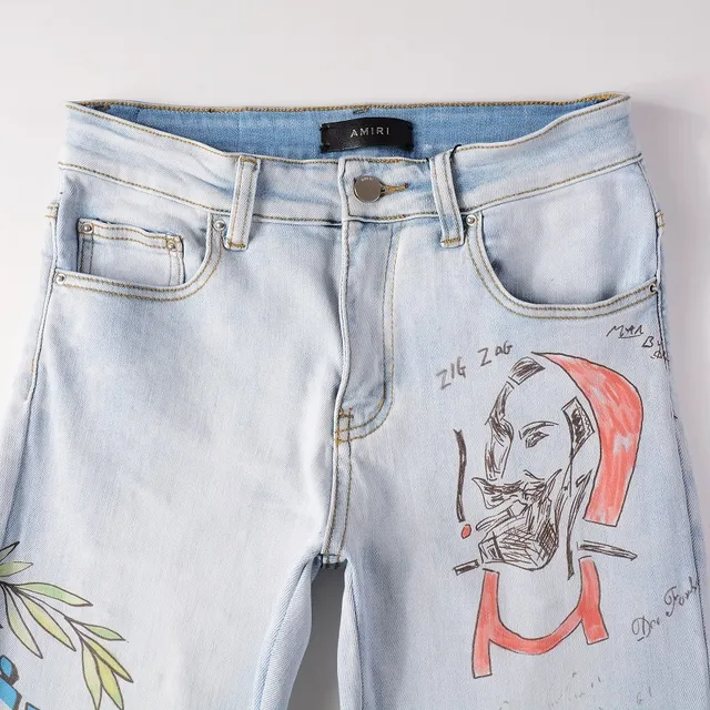 Amiri Graffiti Print Light-Wash Slim-Fit Jeans 14