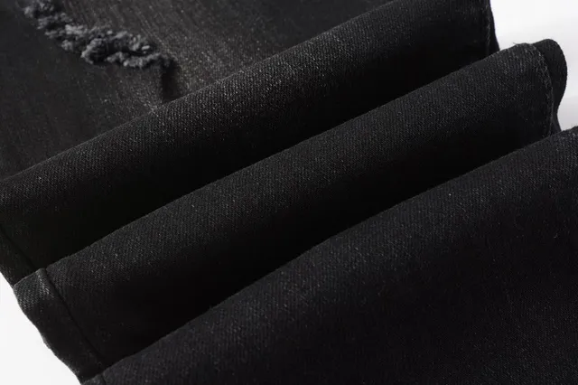 Amiri impression graphique distressed jeans en denim noir 2