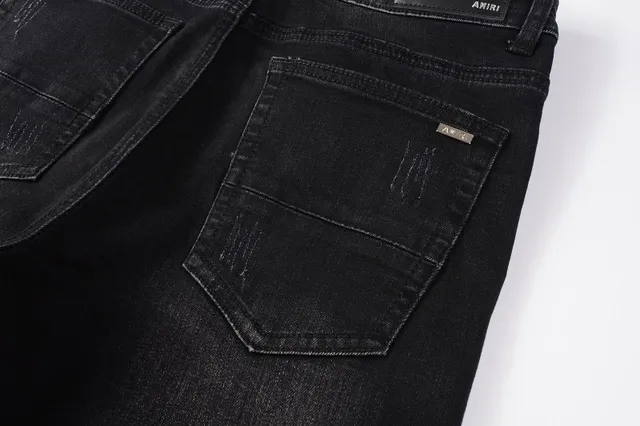 Amiri impression graphique distressed jeans en denim noir 5