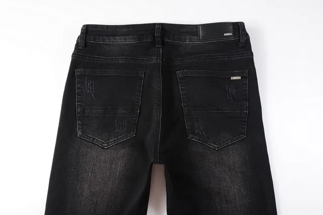 Amiri impression graphique distressed jeans en denim noir 6
