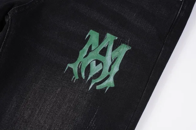 Amiri impression graphique distressed jeans en denim noir 9