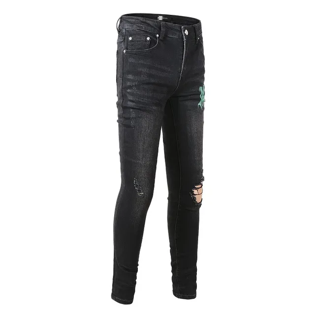 Amiri impression graphique distressed jeans en denim noir 18
