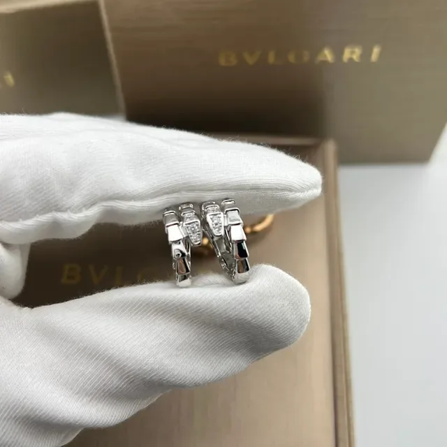 Bvlgari Boucles d'Oreilles Argent et Or Articulées Segmentées Motif Central Diamanté 5
