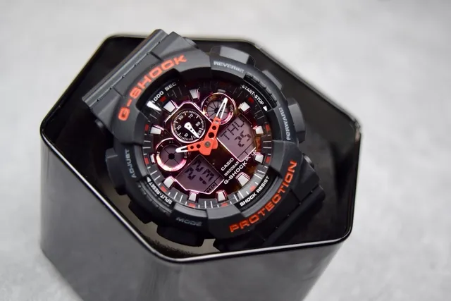 كاسيو G-Shock GA-100 أسود وبرتقالي ساعة رياضية 4