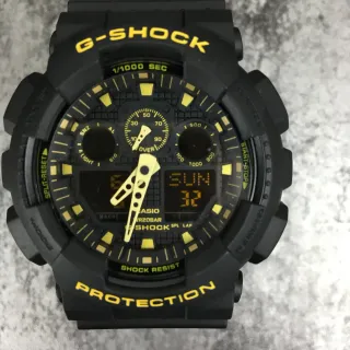 Casio G-Shock GA-100 কালো ও হলুদ অ্যানালগ-ডিজিটাল স্পোর্টস ওয়াচ