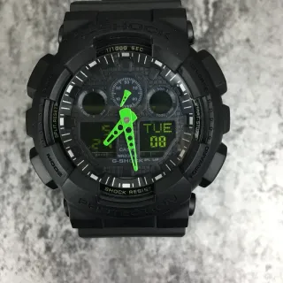 Casio G-Shock GA-100 Negro Verde Construcción de Resina Mate Acentos Lima Bold Reloj
