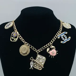 Chanel Multi-Charms Gold-Tone Enamel and Pearl Necklace