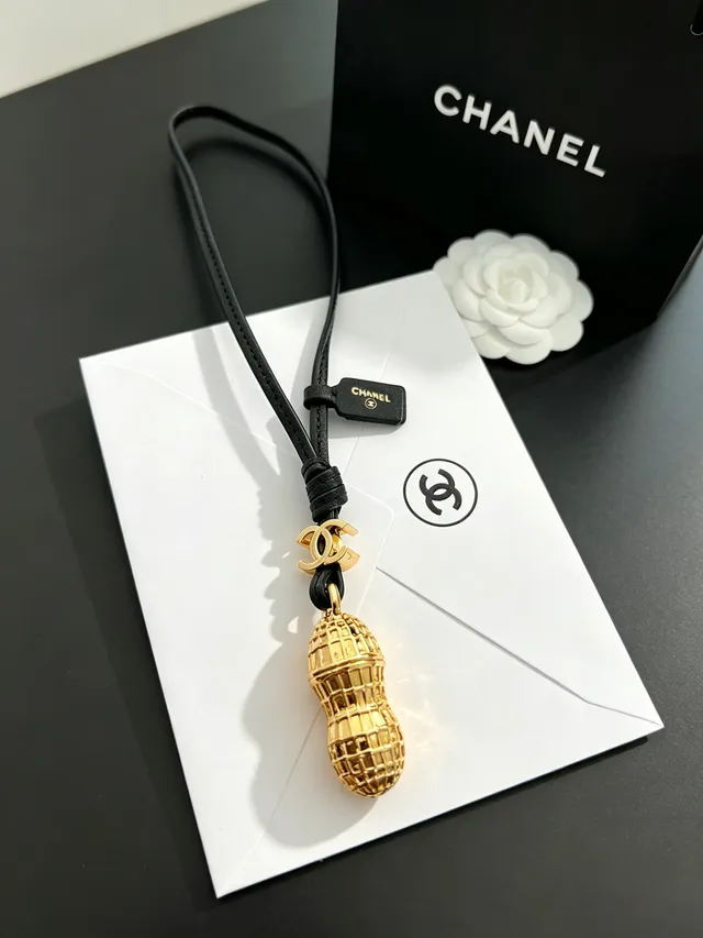 Chanel Peanut Charm Gold-Tone Black Leather Necklace 9