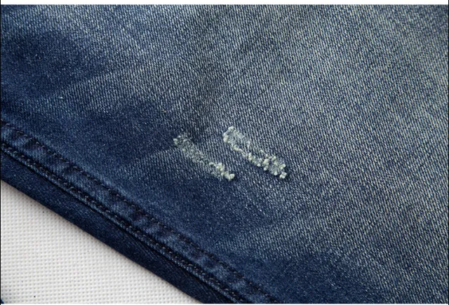 Diesel Distressed Mid-Wash Slim-Straight Jeans 3