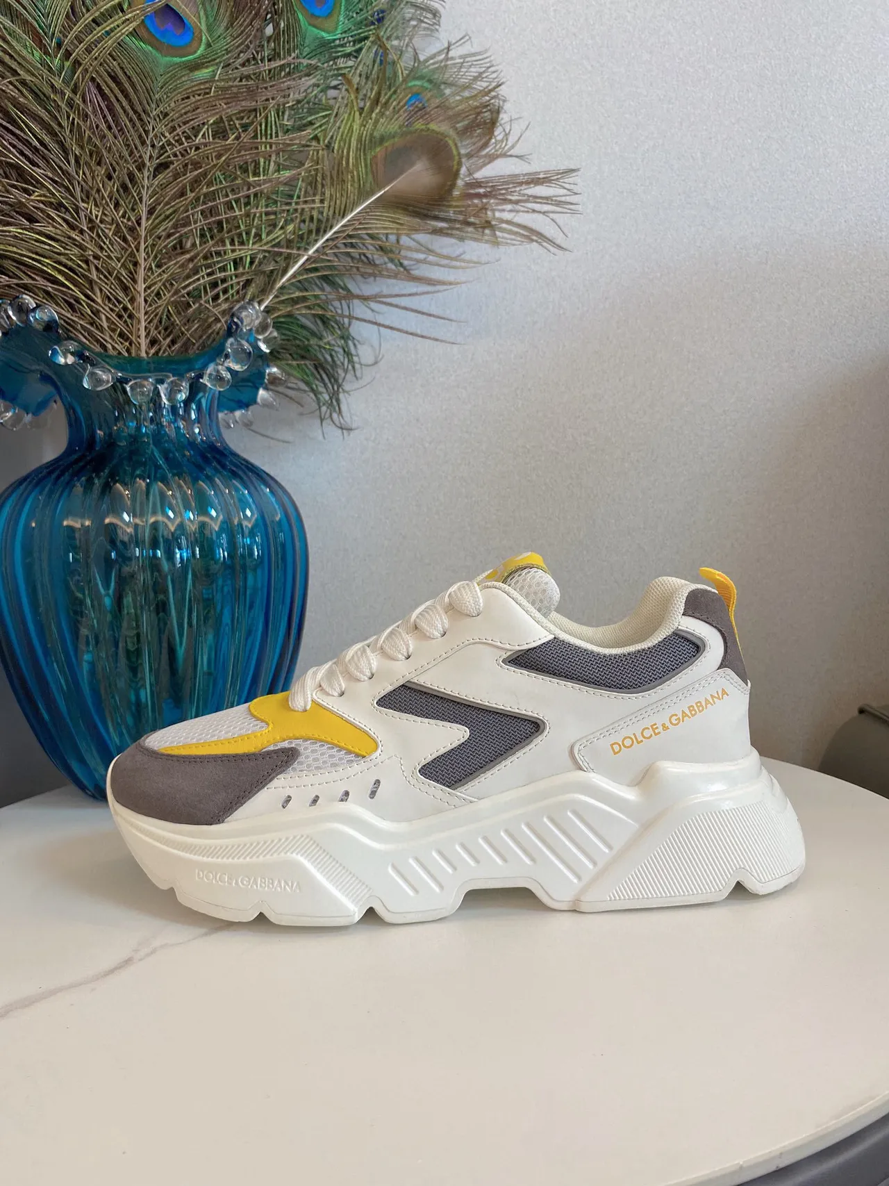 Dolce & Gabbana Portofino sneakers chunky semelle blanche jaune blocage couleur asymétrique 5