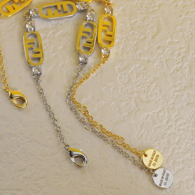 Bracelet Fendi FF Chaîne à mailles en or et argent avec charmes logo 2