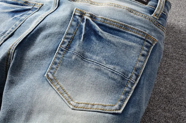 Distressed Light-Wash Blue Embroidered Slim-Fit Jeans 6