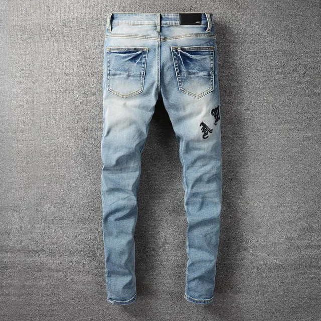 Distressed Light-Wash Blue Embroidered Slim-Fit Jeans 9