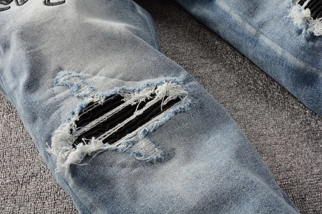 Distressed Light-Wash Blue Embroidered Slim-Fit Jeans 12