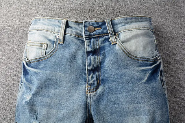 Distressed Light-Wash Blue Embroidered Slim-Fit Jeans 16