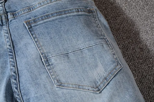 Distressed Ripped Patched Light-Wash Blue Jeans 7
