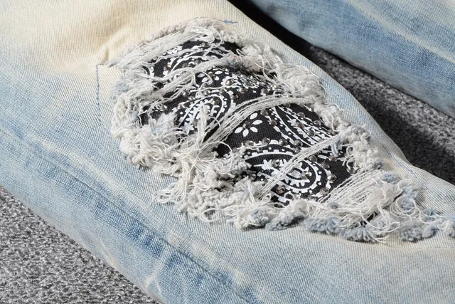 Distressed Slim-Fit Light-Wash Blue Jeans 9