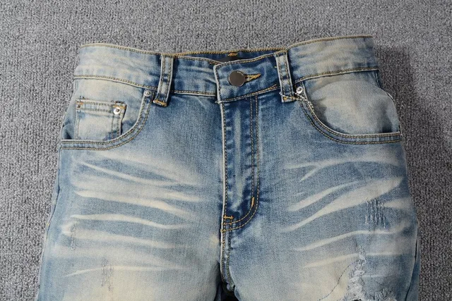 Distressed Slim-Fit Light-Wash Blue Jeans 12