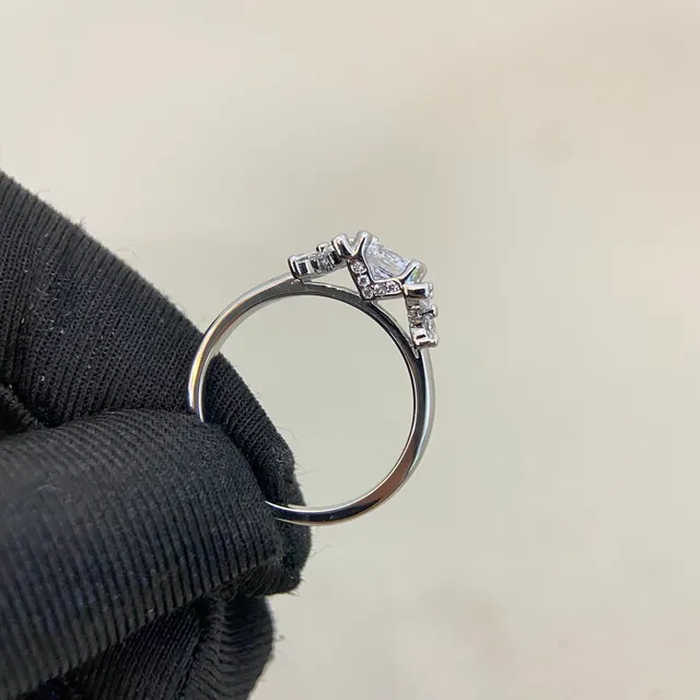 Floral Motif Three-Stone Round Cut Ring 5